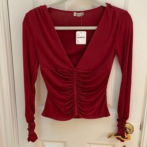 Free people red shirt perfect for a night out or holiday. Size XS new with tags